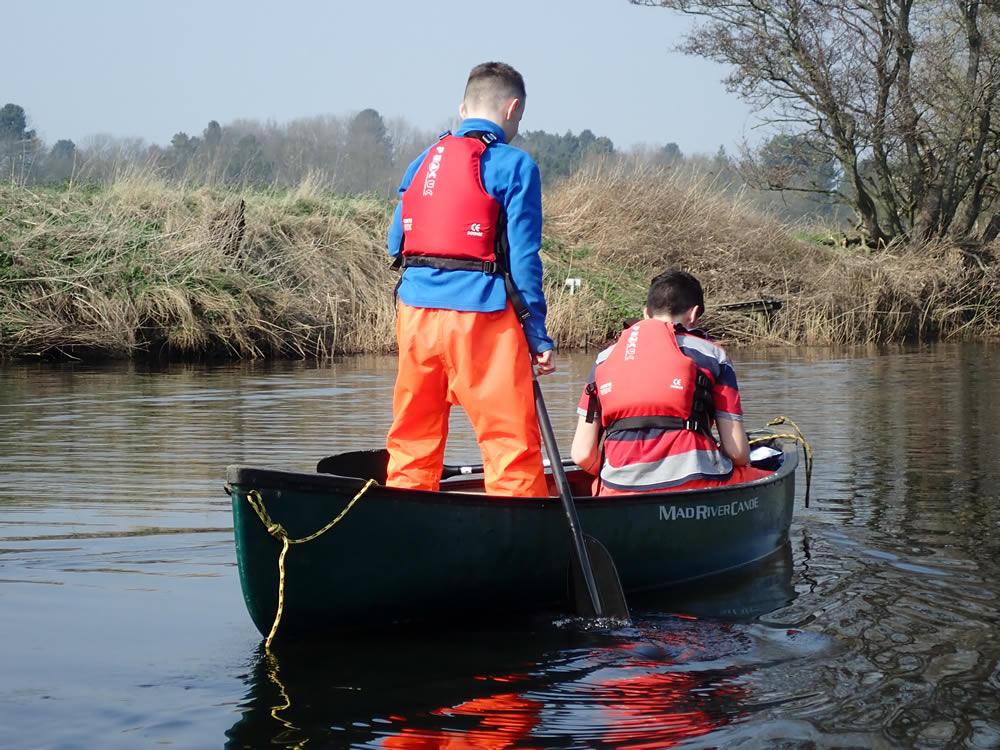 two pupils in a canoe